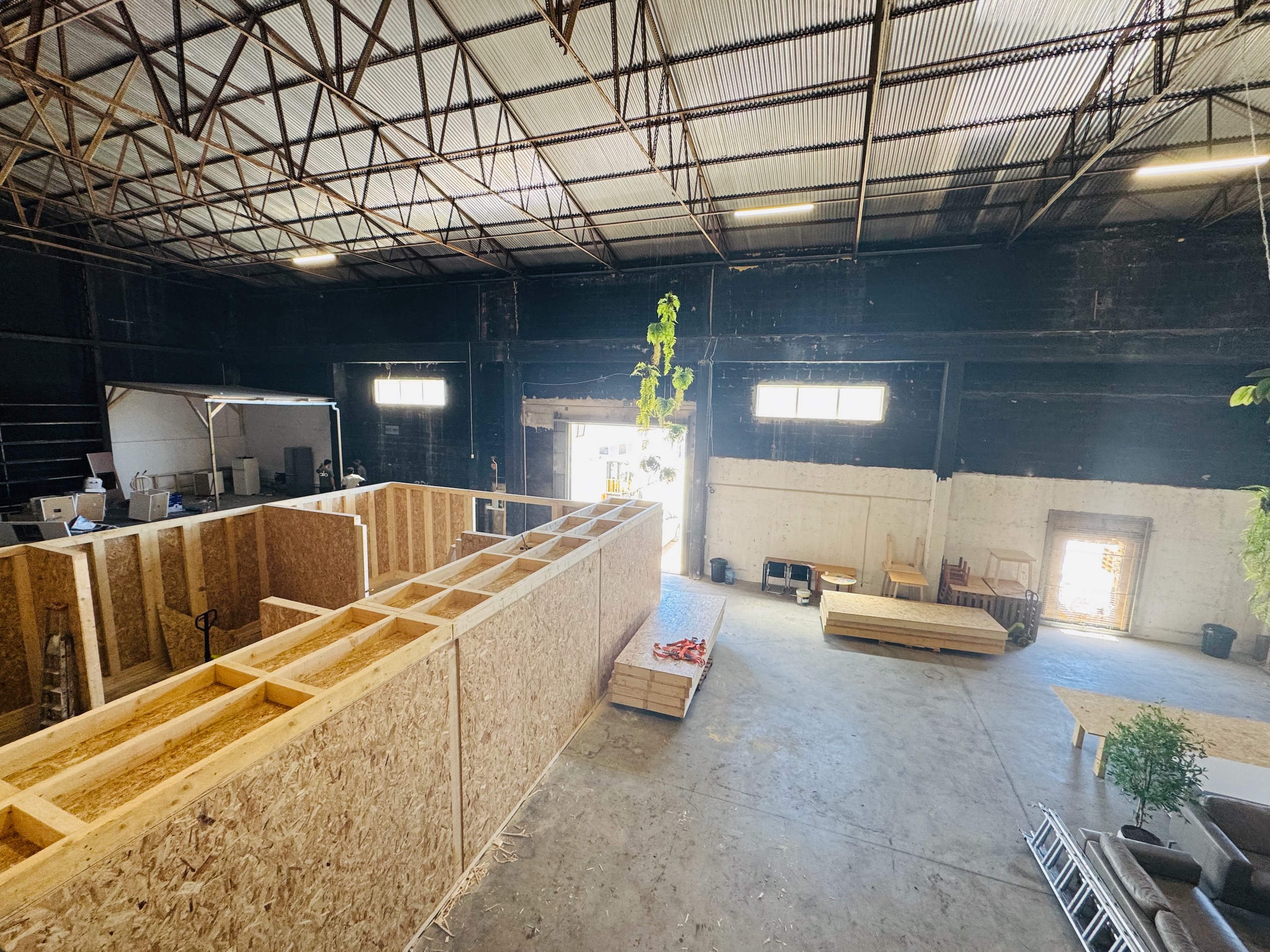 Wide overview of new timber workshop spaces under construction