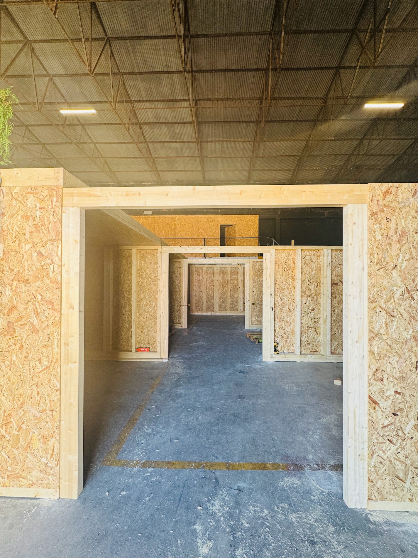 Interior view through new timber workshop entrances